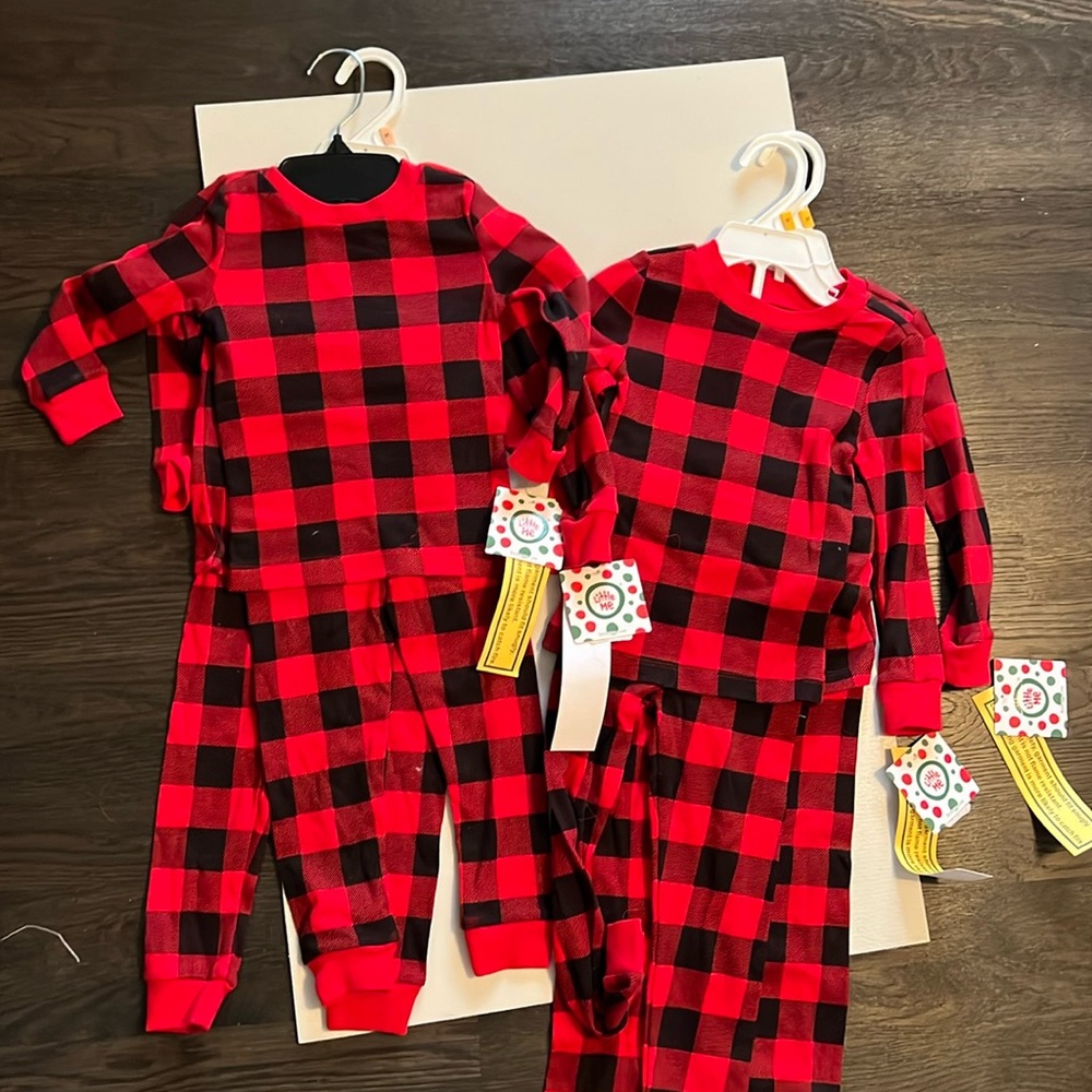 Matching unisex Little Me Christmas buffalo check red/black PJs.